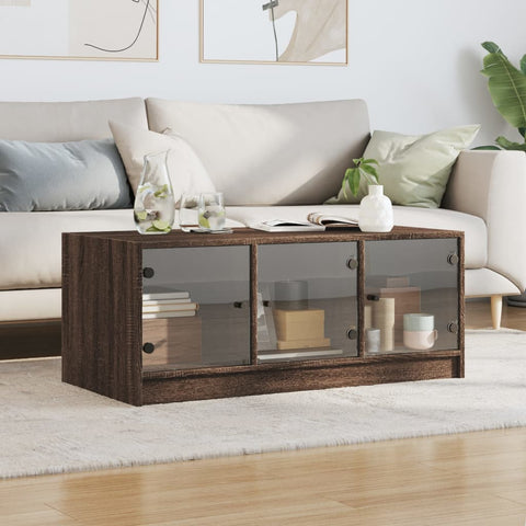 vidaXL Couchtisch mit Glastüren Braun Eichen-Optik 102x50x42 cm